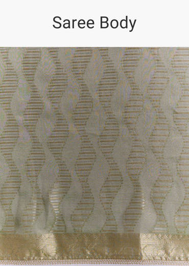 Light Green Tissue Saree With Subtle Weave And Zari Border