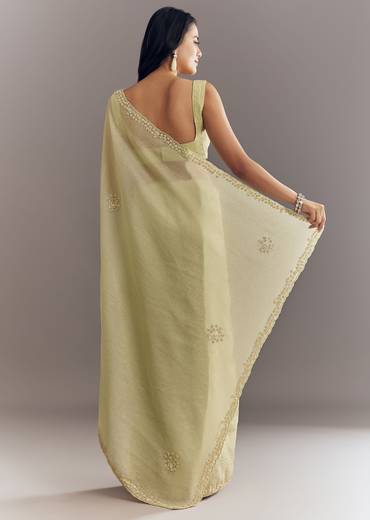Light Pastel Green Crushed Tissue Saree With Cutdana Sequins And Beads Embroidery