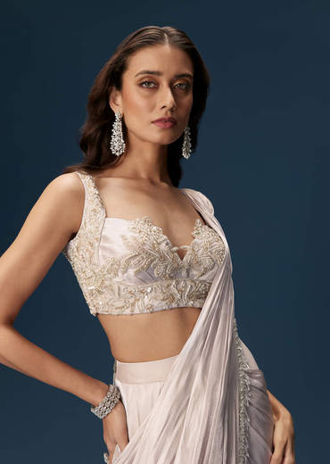 Off White Saree With Embroidered Blouse