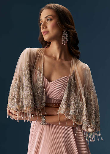 Peach Lehenga With Embroidered Blouse And Coordinating Cape
