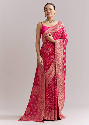 Pink Georgette Woven Saree With Floral Border And Bandhani Print
