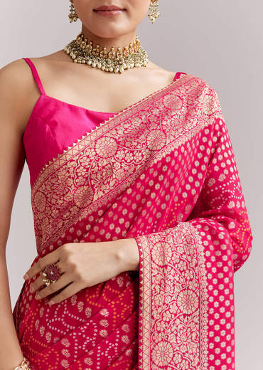 Pink Georgette Woven Saree With Floral Border And Bandhani Print