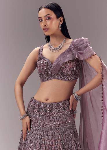 Purple Draped Blouse with Embellished Lehenga