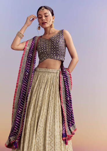 Purple Brocade Silk Bridesmaid Lehenga With Leheriya Dupatta And Zardosi Work