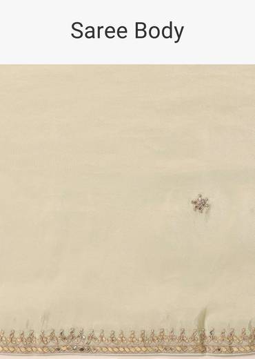 Green Tissue Silk Saree With Gota Patti Work And Unstitched Blouse Piece