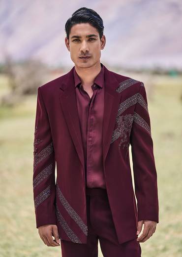 Deep Wine Self Embroidered Tuxedo With Geometric Motifs