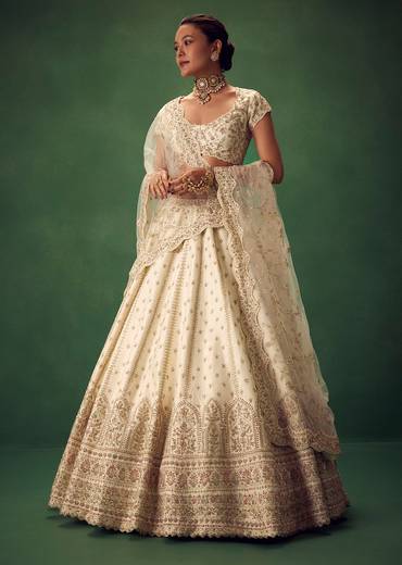 Ivory Lehenga Set With Hand Embroidered Thread And Zari Work