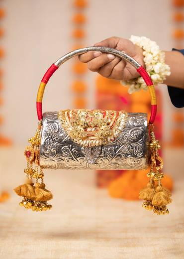 Silver and Gold Embossed Metal Bag with Tassels