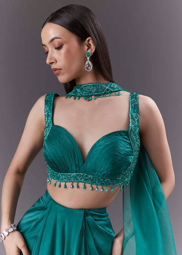 Teal Satin Crop Top And Drape Skirt Set With Heavy Embroidery