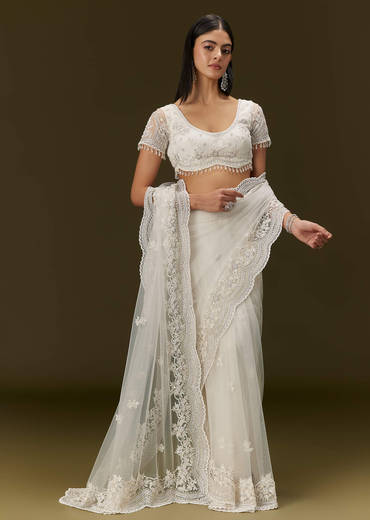 White Net Saree With All Over Embroidery