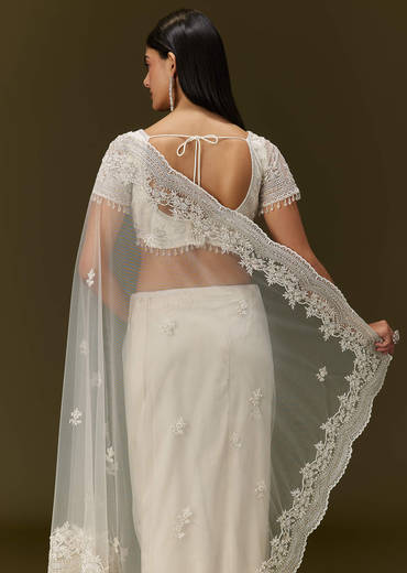 White Net Saree With All Over Embroidery