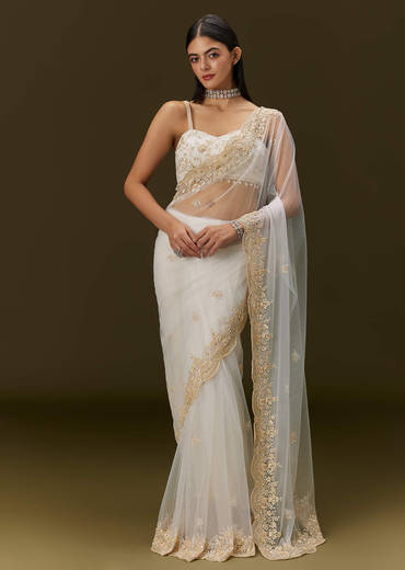 White Net Heavy Embroidered Saree With Embellished Border