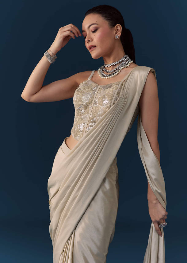 Beige Pre Pleated Saree with Sequin Corset Blouse