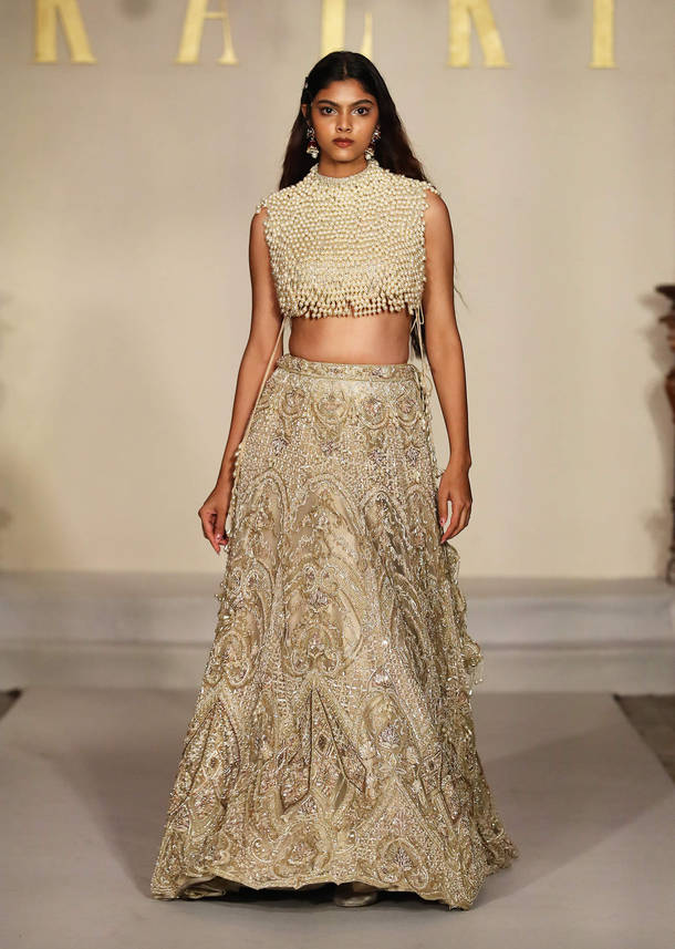 Gold Net Bridal Lehenga With Mother Of Pearl Work