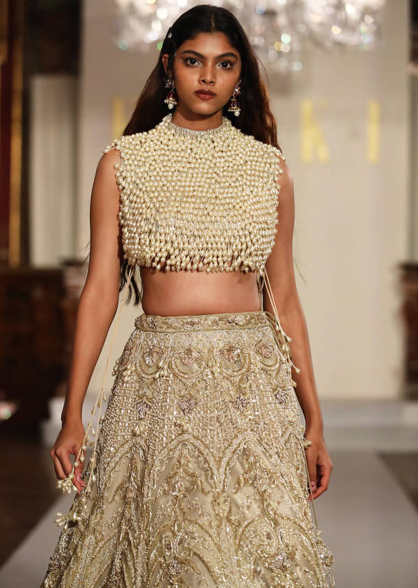 Gold Net Bridal Lehenga With Mother Of Pearl Work