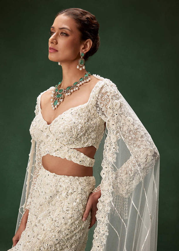Ivory Mermaid Bridal Lehenga With Full Sleeves And Heavy Embroidery