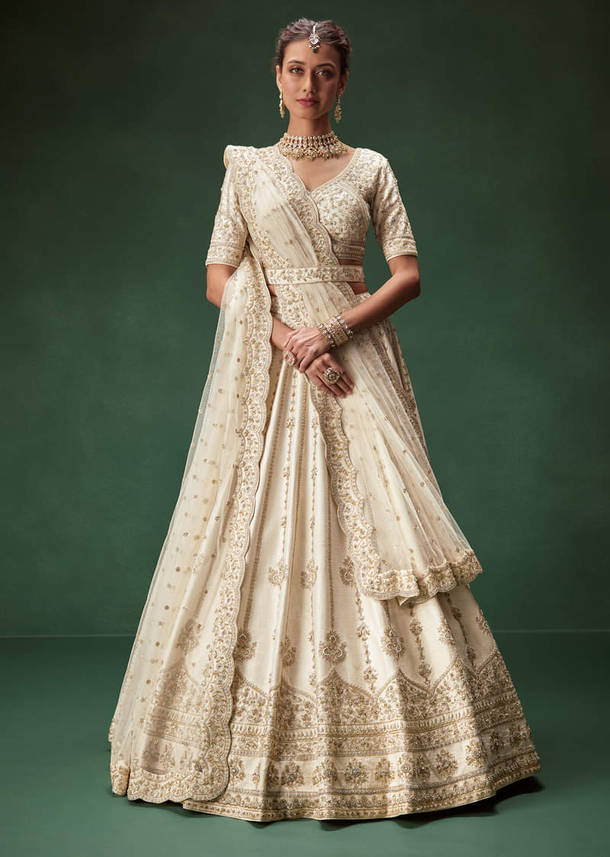 Off White Bridal Lehenga Set With Boat Neck Blouse And Regal Zari Work