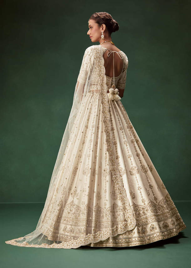 Off White Bridal Lehenga Set With Boat Neck Blouse And Regal Zari Work