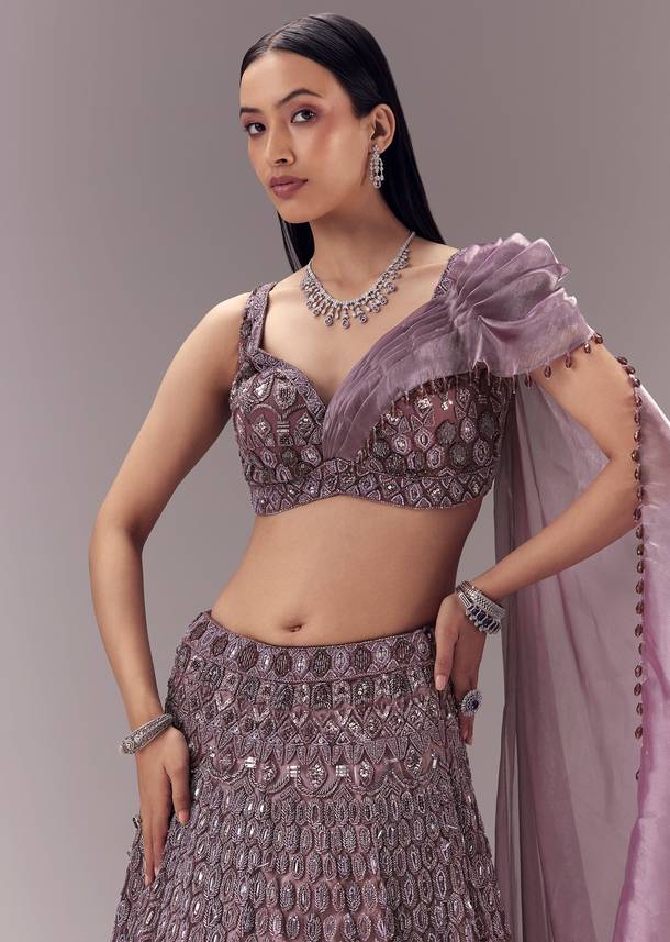 Purple Draped Blouse with Embellished Lehenga