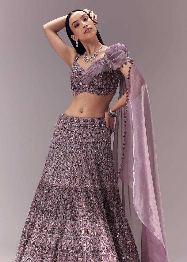 Purple Draped Blouse with Embellished Lehenga