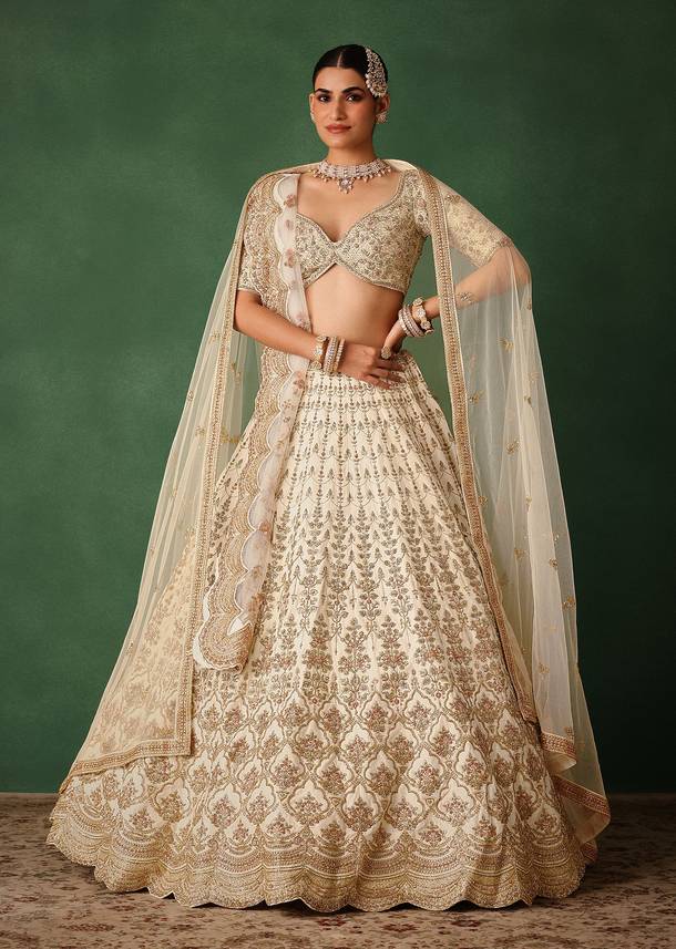 White Hand Embroidered Lehenga Set In Raw Silk