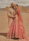 Maroon Embroidered Lehenga For Her & Champagne Hand-Embroidered Sherwani For Him