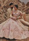 Pink Satin 3D Floral Printed Bridal Lehenga For Her & Gold Hand Embroidered Open Bandhgala Set For Him