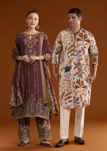 Heritage Maroon Elegance Couple Set – Maroon Printed Zari Kurta Set with Pant and Dupatta for Her And Cream Embroidered Rawsilk Kurta Set for Him