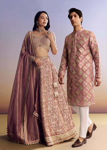 Elegant Couple Set – Light Pink Banarasi Silk Lehenga Set with Embroidered Choli for Her And Pink Silk Kurta Set with Mirror Geometric Print for Him