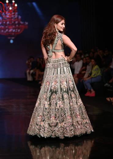 Palace Green Lehenga Choli In Velvet With Multi Colored Hand Embroidered Heritage Kalis With Hints Of Flowers