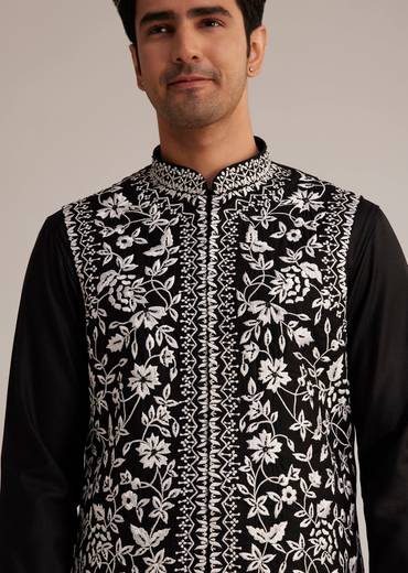 Midnight Black Royal Pair – Pakistani Style Palazzo Suit For Her And Black Silk Kurta With Embroidered Nehru Jacket For Him
