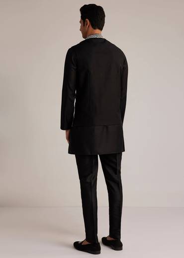 Midnight Black Royal Pair – Pakistani Style Palazzo Suit For Her And Black Silk Kurta With Embroidered Nehru Jacket For Him