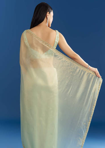 Aqua Blue Organza Tissue Embellishd Saree With Scallop Border