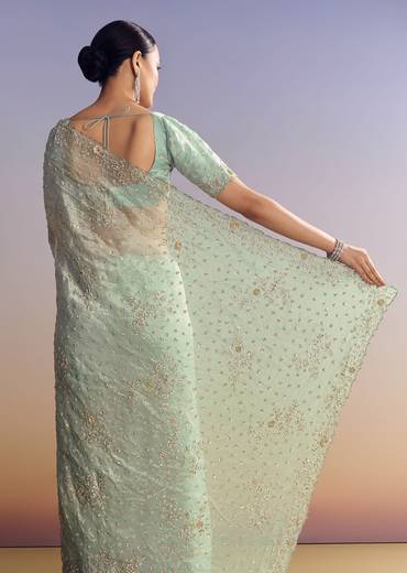 Aqua Blue Tissue Saree With Cutwork And Unstitched Embellished Blouse