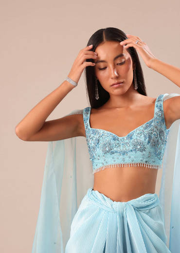 Blue Pre Pleated Twisted Skirt And Blouse With Attched Cape