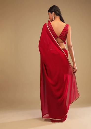 Cherry Red Saree In Georgette With Sequins And Cut Dana Embellished Border And A Ruffle Frill Adorned Crop Top