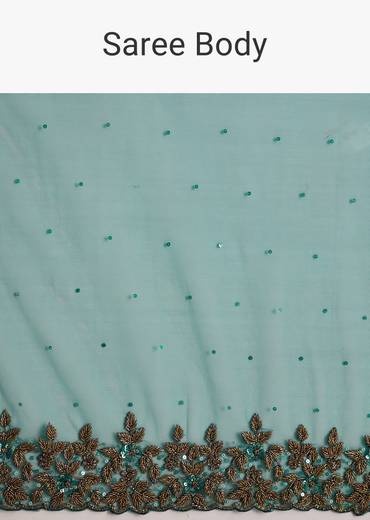 Green Net Saree Featuring Heavy Embroidered Border