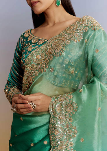 Green Shaded Tissue Saree With Floral Embroidery And Sequins Blouse