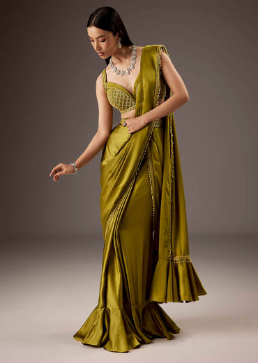 Green Silk Saree With Elegant Bead Work And Frills