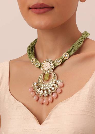 Green Kundan Pendant Necklace Set With Pink Bead Drops And Crescent Moon Motif