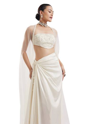 Ivory Halter Neck Crop Top And Drape Skirt With Net Cape