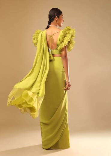 Lime Green Saree In Crepe With Elaborate Ruffle Sleeved Crop Top And Heavy Stone Embroidered Belt