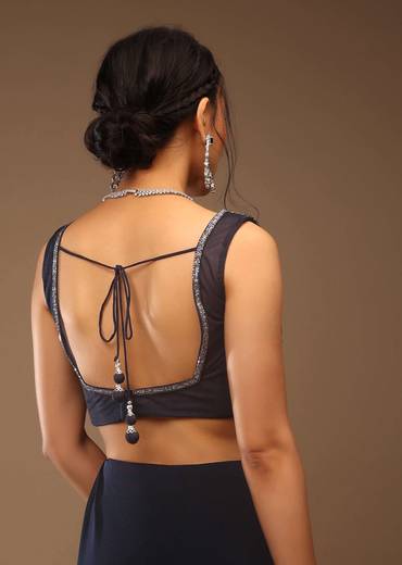 Mood Indigo Pre Drape Saree With A Crop Top In Sequins Embroidery Corset Neckline With A Tie-Up Tassel Dori At The Back