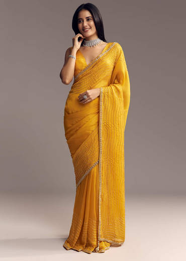 Mustard Yellow Organza Saree With Scallop Border And Stone Work