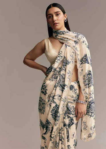 Off White Crepe Saree With Black Floral Print And Embroidered Border