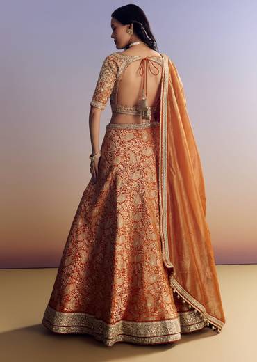 Orange Banarasi Lehenga With Embroidered Choli And Dupatta