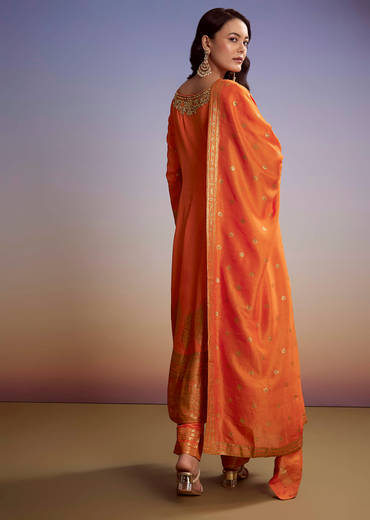 Orange Silk Anarkali Suit With Heavy Embroidery And Weave Border