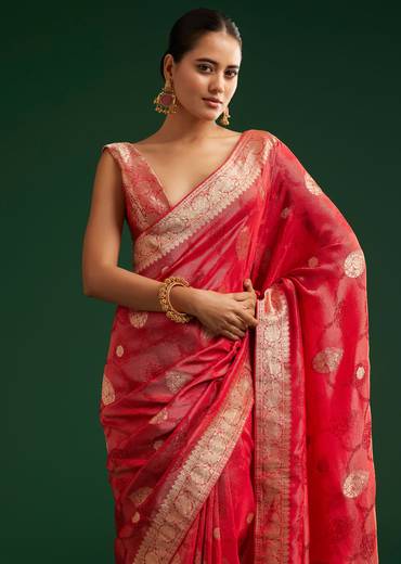 Red Saree With Zari Motif and Heavy Embroidered Blouse