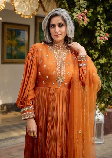 Rust Crepe Anarkali Suit With Pleated Sleeves And Net Dupatta