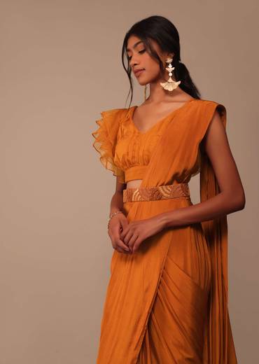 Rust Orange Pre Drape Saree With Fancy Ruffle Blouse And Embroidered Belt
